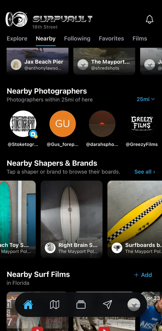 The Nearby tab in the app, with nearby surf films below nearby photographers and shapers